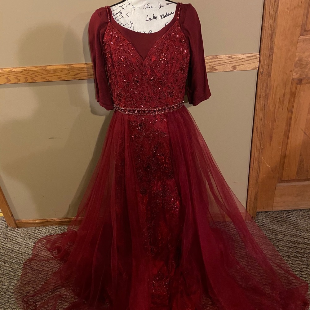 Red caped gown